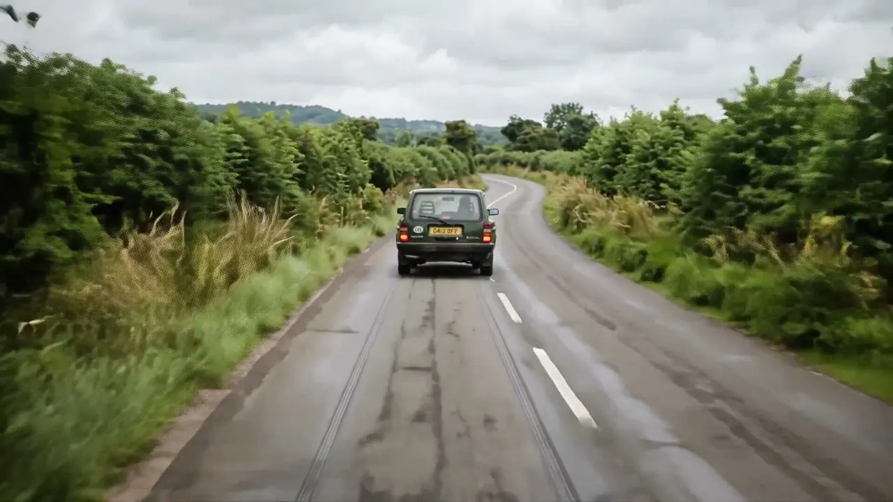 Car Chasing: The camera pursues a moving vehicle and holds it in frame.