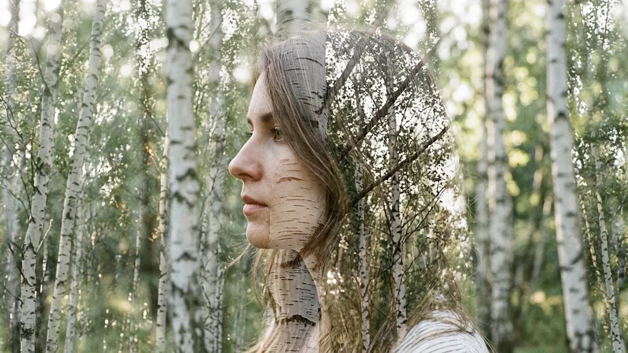 Double Exposure: Two images occupy the same frame and show through each other.
