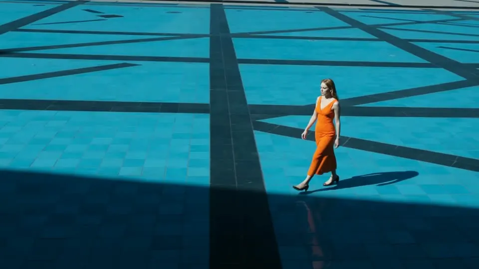 Wide Shot: The frame takes in the space around the subject.